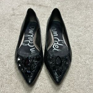 Black snake skin flats with black jewels